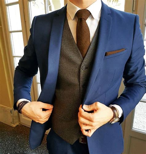 navy blue suit brown tie